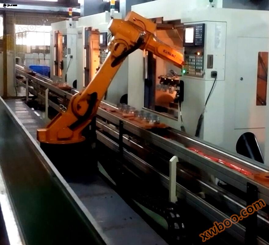 Automatic loading and unloading robotic arm for lathe